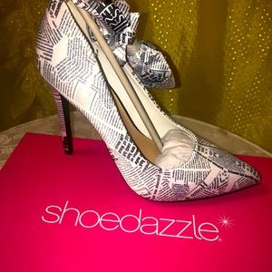 Truth Comes Out Newspaper Print Ankle Wrap Pump